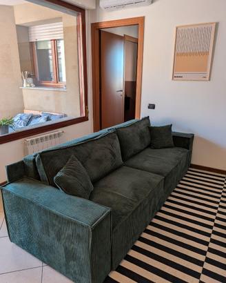 Divano letto in velluto verde a costine