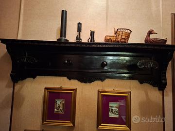 Attacapanni antico dipinto di nero