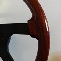 Volante in  legno radica