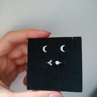 Anello e orecchini in acciaio luna