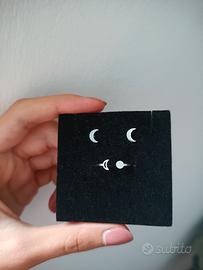 Anello e orecchini in acciaio luna