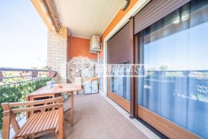APPARTAMENTO CON DOPPIO BALCONE E POSTO AUTO