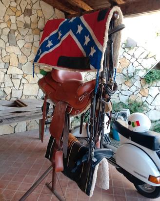 sella,sottosella e accessori vari con portasella