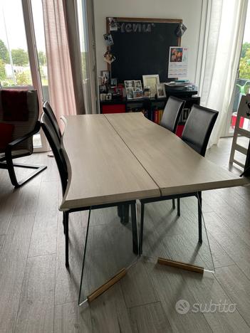 Tavolo con gambe di vetro e lastre finto legno usato  Modena