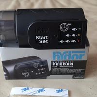 Distributore mangime acquario