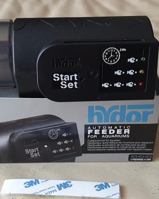 Distributore mangime acquario