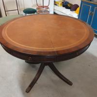 tavolo tondo allungabile in legno e cuoio