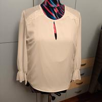 camicetta donna aperta sulla schiena