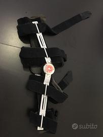 Tutore/ginocchiera post operatoria e stampelle