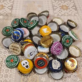 Tappi USATI di birre varie per hobby creativi  ecc