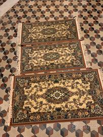 Tris tappeti persiani per camera da letto