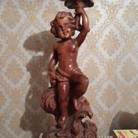 Angelo in legno portavaso