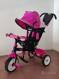 Triciclo a spinta con pedali e capottina