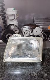 Faro anteriore sinistro H4 Ford Escort 
