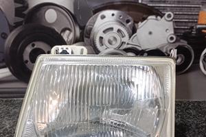 Faro anteriore sinistro H4 Ford Escort 