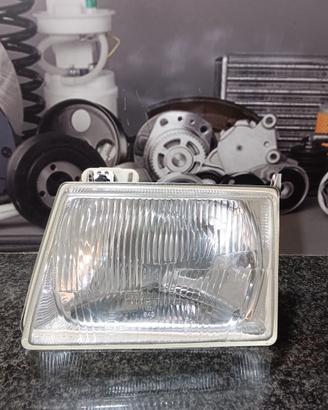 Faro anteriore sinistro H4 Ford Escort 