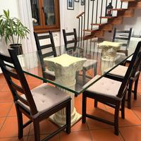 Tavolo in vetro con colonne in stile classico