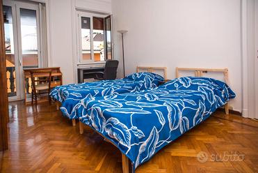 Stanza due letti zona Vittoria