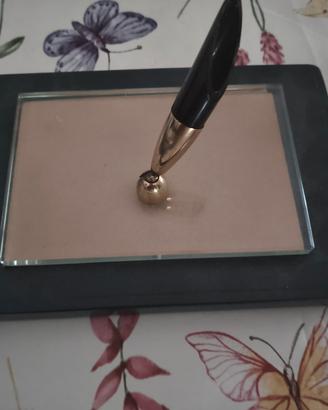 stiloforo vintage con penna stilografica