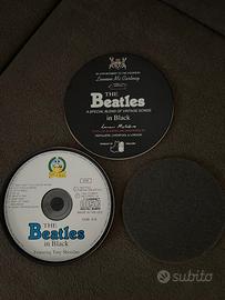 CD The Beatles in Black - Lennon Mc Cartney