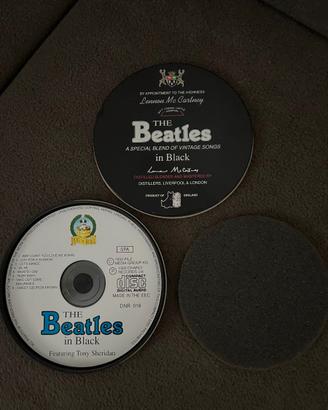 CD The Beatles in Black - Lennon Mc Cartney