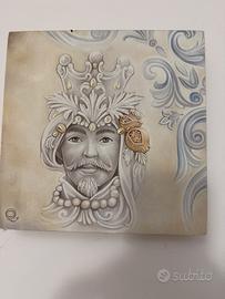 Quadro raffigurante le teste di Moro stilizzate