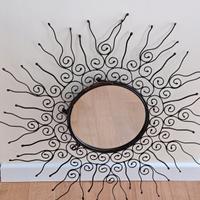 specchio su cornice in ferro battuto