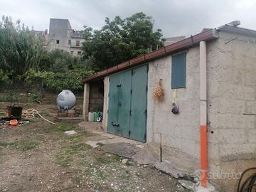 terreno con rustico