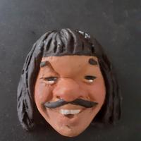 caricatura in ceramica di Ruud Gullit