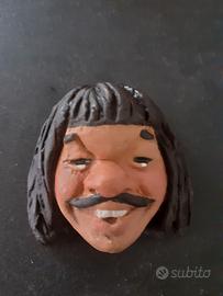 caricatura in ceramica di Ruud Gullit