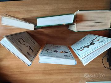 libri vari cani farfalle alberi geografia 