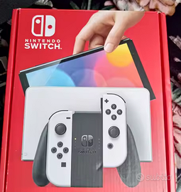 Nintendo Switch OLED Bianca + 3 Giochi