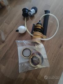 Meccanismo di scarico