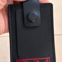 Tumi etichetta per valigie