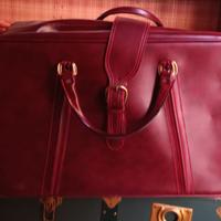 Valigia in pelle bordeaux