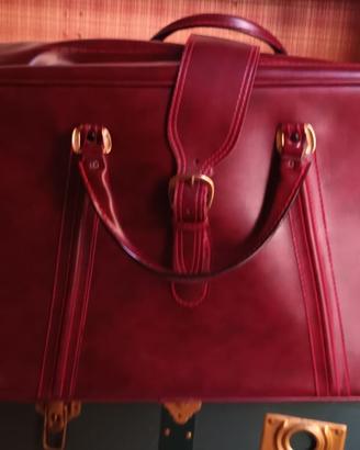 Valigia in pelle bordeaux
