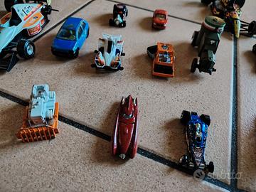 auto piccoline varie in acciaio con gomme,