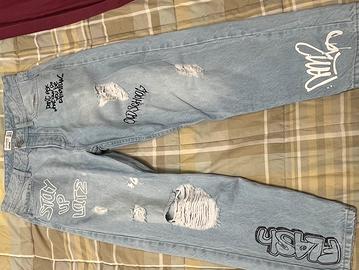 Jeans strappati fantasia