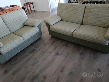 coppia di divani con divano-letto