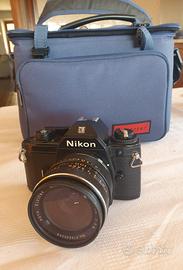 Nikon EM Reflex con borsa + grandangolo 28mm Vivit
