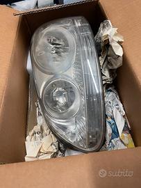 Fari sx dx golf 5  originali usati