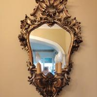 specchiere dorate con luci