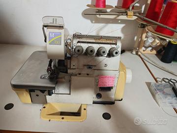 macchina da cucire tagliacuci industriale 
