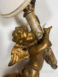 Coppia di putti dorati