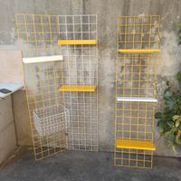 Libreria  "portarobe" eseguita da Robots anni 70