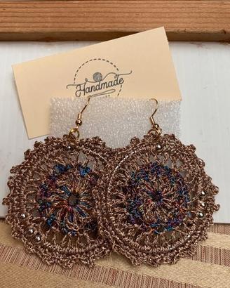 Orecchini in cotone laminato color bronzo €12