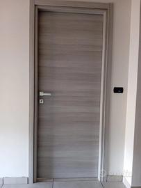 PORTA A BATTENTE BUILDING 90X210 cm ROVERE GRIGIO.