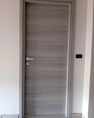 PORTA A BATTENTE BUILDING 90X210 cm ROVERE GRIGIO.