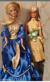 2 barbie con vestito 