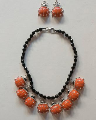 Set collana e orecchini con coccinelle 
